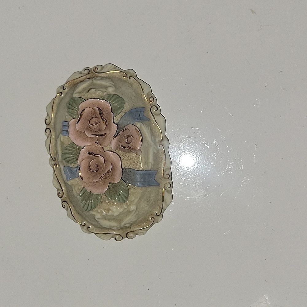 Small Figurine With Flowers